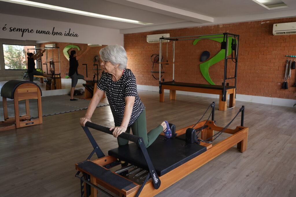 Aluna praticando no studio de pilates da Ranc